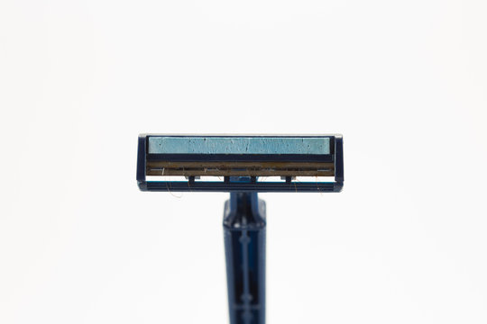 Used and Dirty Blue Razer Blade Isolated on White Background