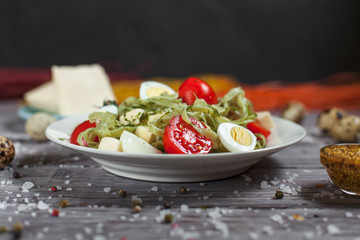 pasta from green spinach with mozzarella, greens and French mustard, quail eggs and cherry tomatoes...