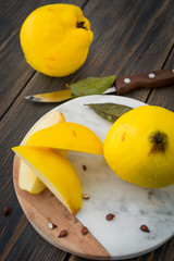 Sliced yellow quince or queen apple autumn fruits with seeds