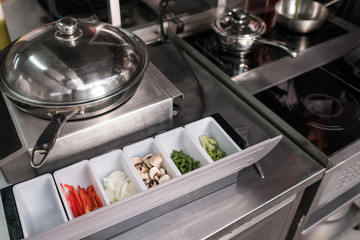 Fresh ingredients for a healthy vegetarian meal laying chopped and separated prepared for cooking