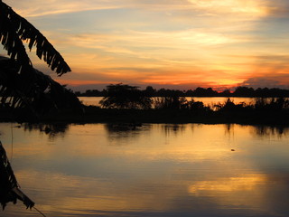The Mekong in flood at sunset
