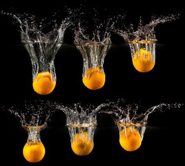 Group of fresh fruits falling in water