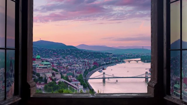 budapest skyline timelapse at sunset seen through window
