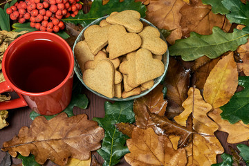 Heart cookie. Different leaves. Black tea. Rowan branch