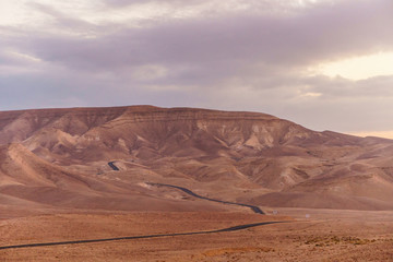 Scenic landscape of magic blue sky and sunrise over judean desert in Israel holy land.