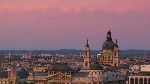 establishing shot of  st stephen church at sunset budapest