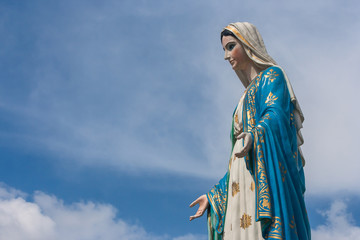 The Blessed Virgin Mary statue standing in front of The Cathedral of the Immaculate Conception at...