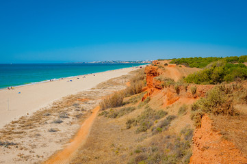 Fototapeta na wymiar Portugal, Albufeira, portuguese beach with cliffs (PRAIA DA OURA)
