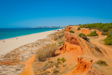 Fototapeta na wymiar Portugal, Albufeira, portuguese beach with cliffs (PRAIA DA OURA)