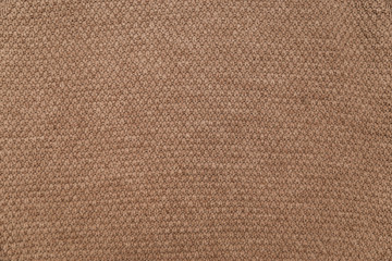 Winter Sweater Design. Brown knitted fabric texture.