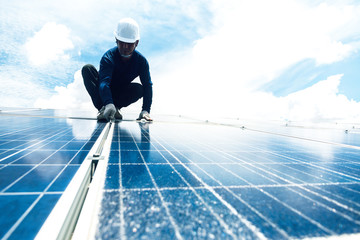 engineer team working on replacement solar panel in solar power plant;engineer and electrician team...