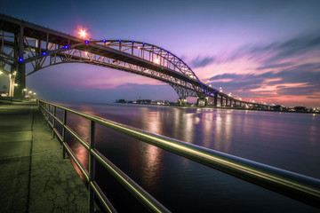 Blue Water Bridge Cityscape Panorama. The waterfront district of Port Huron, Michigan with the Blue...