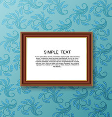 Gold vintage picture frame on blue wall