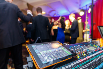 The disco, Banquet, people blurred background dancing. Dj panel 
