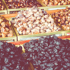 Fototapeta premium Nuts and dried fruit for sale in the souk of Fes, Morocco