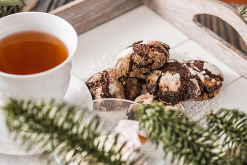 Chocolate cookies. Cookie with cracks. Cracked chocolate biscuits. Christmas chocolate cookies. Christmas biscuits. Chocolate cookies with cracks.