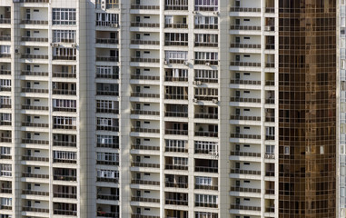 Modern architecture with a lot of square glass windows and colors on the building.