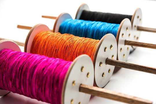 Fikri /Reel/Chakri /Spool with colourful thread or manjha or manja for Kite flying in Indian festival called Makar Sankranti which is uttarayan or uttarayana