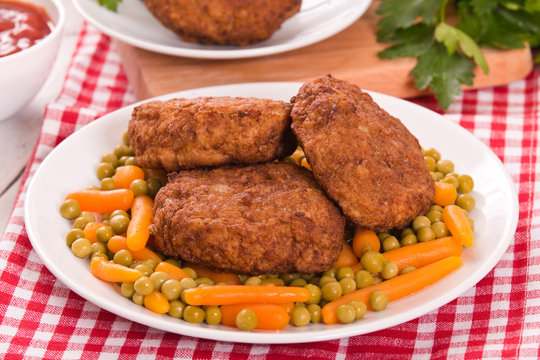 Meatballs on white dish. 