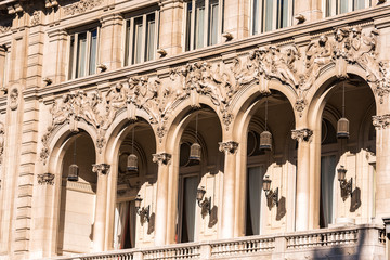 View of the facade of the historic building in Madrid, Spain. Close-up.