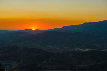 View of the mountain landscape at sunset in Siurana de Prades, Tarragona, Spain. Copy space for text.