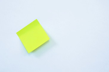 yellow paper note stick on white background