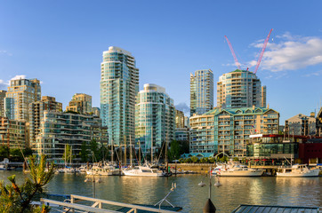 Fototapeta na wymiar Modern Apartment Blocks in Downtown Vancouver at Sunset. British Columbia, Canada.
