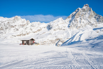 Fototapeta na wymiar View of Italian Alps and Matterhorn Peak in Cervinio ski resort in the winter, Italy