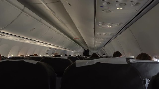 Passengers in comfortable seats of aircraft