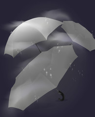 Umbrellas with raindrops on a dark background