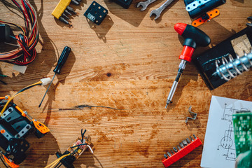 Background of wooden table with electrical tools