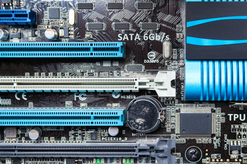 Fototapeta premium Fragment of a motherboard of personal computer as background