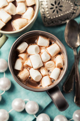 Hot chocolates with marshmallows in Christmas setup