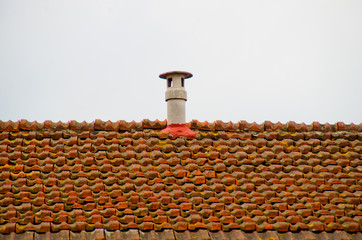 roof vent on red brick roof