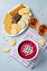Beet hummus with Feta and black sesame