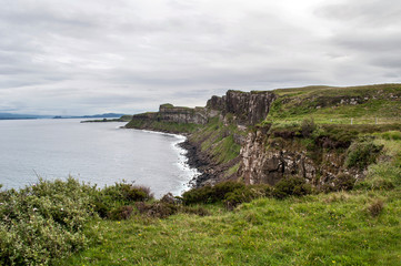 Fototapeta na wymiar Rocks above the sea on the coast of Skye in Scotland