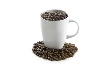 White cup and coffee beans