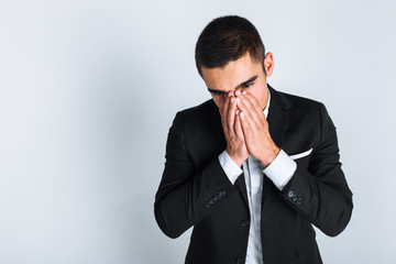 Frustrated man in Studio on white background, isolated, business style, stylish, suit