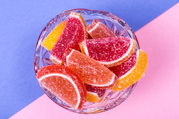 Fruit marmalade on bright colored background