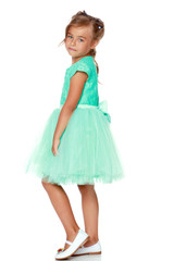 Fashionable little girl in a dress