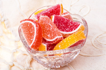 Fruit marmalade on bright colored background