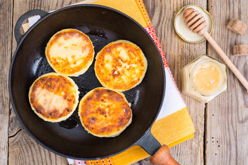 Four ruddy cottage cheese cakes