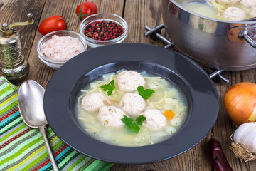 Chicken soup with vermicelli and meatballs