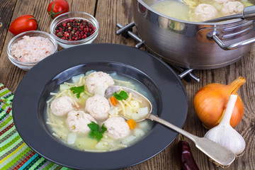 Chicken soup with vermicelli and meatballs