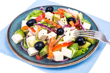 Greek salad with feta, avocado and black olives