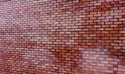 Fototapeta na wymiar Background of vintage old brick wall texture, grunge style background with diminishing perspective