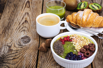 Espresso, croissant and fruit dessert for breakfast