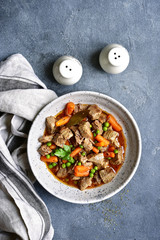 Meat stew with carrot and green pea.Top view.