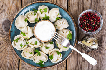 Russian cuisine. Homemade dumplings stuffed meat