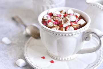Thick hot chocolate with mini marshmallow and festive decoration.